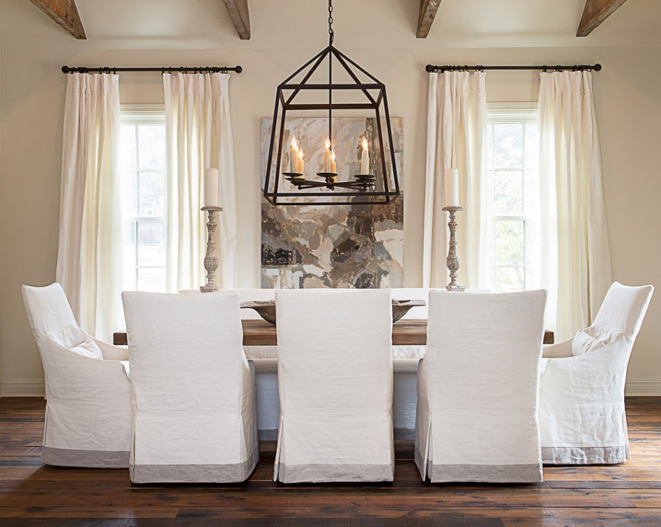 Classical Dining Room Decoration Escorted By Modern White Cotton Covered Chairs Also Unique Cage Like Chandelier Also Outstanding High Ceiling Windows Escorted By White Curtains Plain Dining Room Chair Dining Room Designs