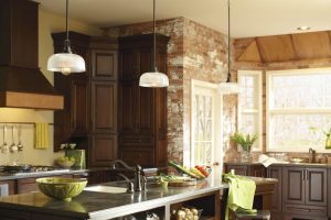 Kitchen Designs Nice White Glass Adjustable 3 Lights Brushed Bronze Kitchen Island Lighting Over Glossy Dark Mosaic Granite Top Island Escorted By Single Arc Faucet Sink As Well As Stack Stones Exposed Wall The Characteristics of Modern Contemporary Kitchen