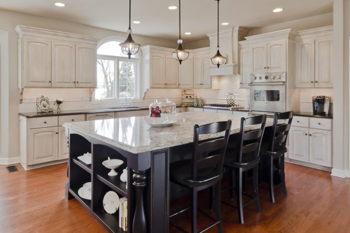 Kitchen Designs Medium size Sweet Three Brushed Olde Bronze Rustic Style Kitchen Island Lighting Over White Gloss Granite Top Black Wooden Island Escorted By Storage Also 3 Black Wooden Barstool On Wooden Floors