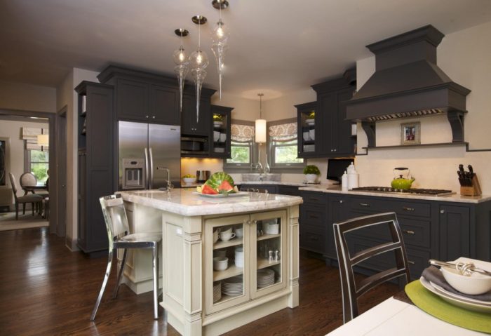 Kitchen Designs Medium size Well Liked Tear Glass Brushed Nickel Chrome Kitchen Island Lighting Over White Wooden Island Escorted By Clear Glass Door Storage As Well As Single Stainless Stool Leg On Wood Floors In Mod