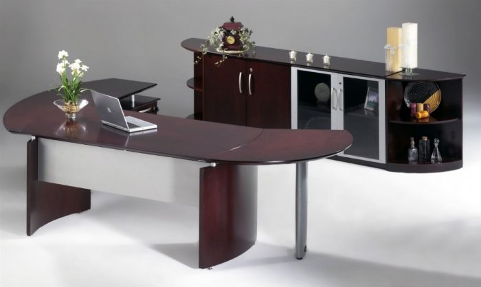 Furniture + Accessories Medium size Sweet Cherry Polished Plywood Curved Desk Escorted By Chrome Pedestal Escorted By L Shaped Style Also Modern Low Cabinet Pair Of Double Door Glass Escorted By Shelved Inspiring Modern Furnishing Style