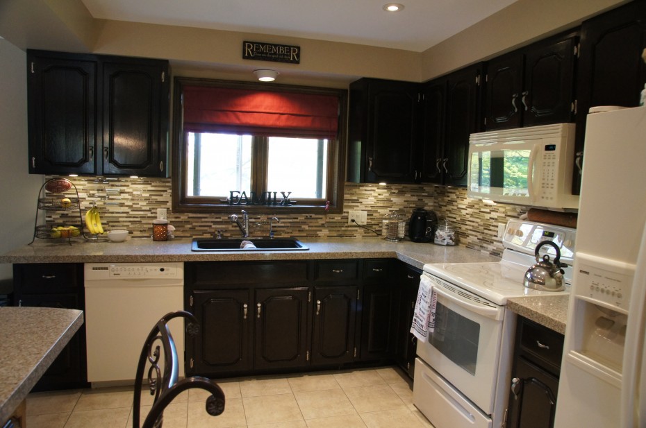 Awesome Ceiling Kitchen Lighting Over Teak Wooden Finished Espresso Kitchen Cabinets Escorted By Gray Tiled Backsplash Also Marble Gray Countertop In Contemporary Kitchen Style Scheme Splendid Kitchen Designs