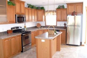 Kitchen Designs Thumbnail size Charming Kitchen Decorating Style Scheme Escorted By Light Brown Small Kitchen Island Also Ligt Grey Marble Top Also Small Metal Sink Cute Golden Honey L Shape Cabinetry See Kitchen