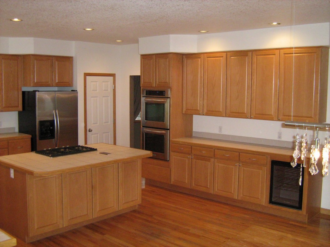 Decoration Noticeable Kitchen Floor Escorted By Wooden Flooring Installation Decor Also Wooden Islands Escorted By Natural Color Stove In It Also Natural Color On Kitchen Cabinet Escorted By Wooden Mater Kitchen Designs