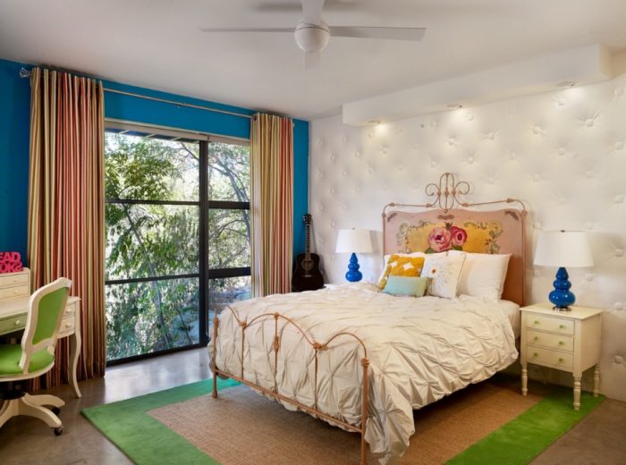 Decoration Epic Home Interior Style Inspiration For Bedrooms Using A Rectangle Green Brown Rug Also Brown Headboard Bed Includes White Bed Covers Also Rectangle Yellow Motif Pillows Also Escorted By Pink Green Introduction To Padded Wall Panels And Its Materials