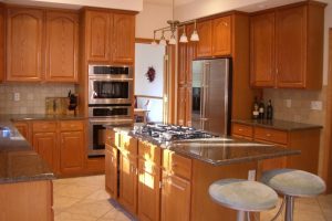 Decoration Thumbnail size Fab Teak Wooden Kitchen Cabinet Added Chandelier Over Small Kitchen Island Storage As Well As Wooden Cabinetry Set In Small Kitchen Decors Scheme Prodigious Small Kitchen