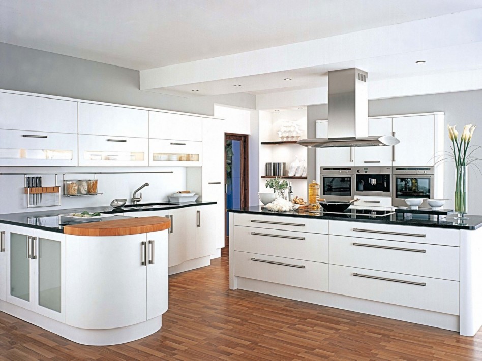 Interesting Solid White Kitchen Cabinet Scheme Style Escorted By Black Marble Top Also Modern Touch Sink Incredible L Shapw White Wooden Cabinetry See Kitchen Island Styles Kitchen Designs