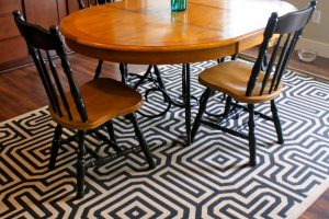 Dining Room Designs Thumbnail size Small Dining Room Using Black White Geometric Rug Under Dining Table Including Oval Light Oak Wood Dining Table Also Round Black Dining Chair Legs Stunning Dining Room Decor