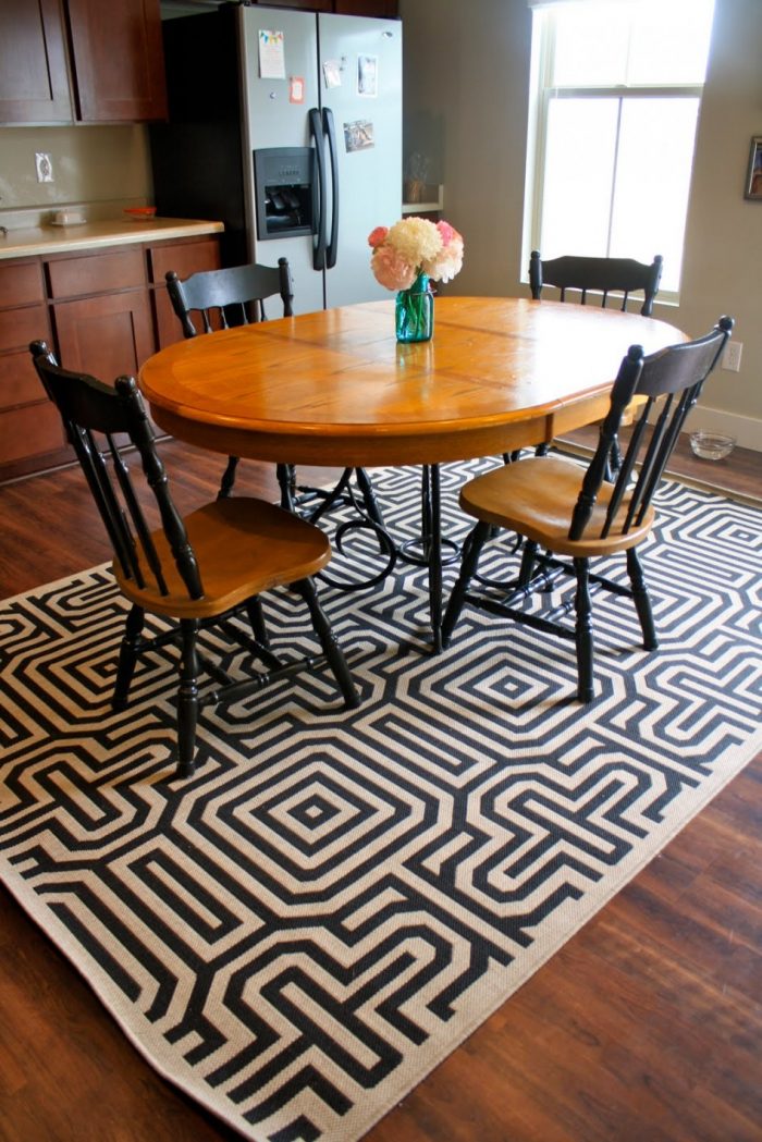 Dining Room Designs Small Dining Room Using Black White Geometric Rug Under Dining Table Including Oval Light Oak Wood Dining Table Also Round Black Dining Chair Legs Stunning Dining Room Decor Dining Room Sideboard Decorating Ideas For Storing Place