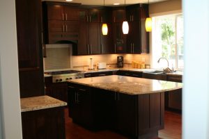 Kitchen Designs Thumbnail size Wonderful Espresso Kitchen Cabinets Also Island Escorted By White Glossy Mosaic Countertop Also Triple Pendant Kitchen Lights As Well As L Shaped Kitchen Cabinetry Set Decorating Scheme Splendid