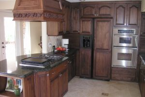 Kitchen Designs Adorable White Ceramic Tiles Flooring Also Custom Wooden Kitchen Range Hood Over Top Stove Also Dark Wood Cabinets For Old Fashion Kitchen Styles Piquant Dark Wood Cabinets For Women Inspiring-Dark-Wood-Cabinets-Escorted-By-White-Stove-Also-Microwave-Shelving-On-Wooden-Tops-As-Decorate-L-Shaped-Kitchen-Scheme-Piquant-Dark-Wood-Cabinets-For-Women-Dream-Kitchen