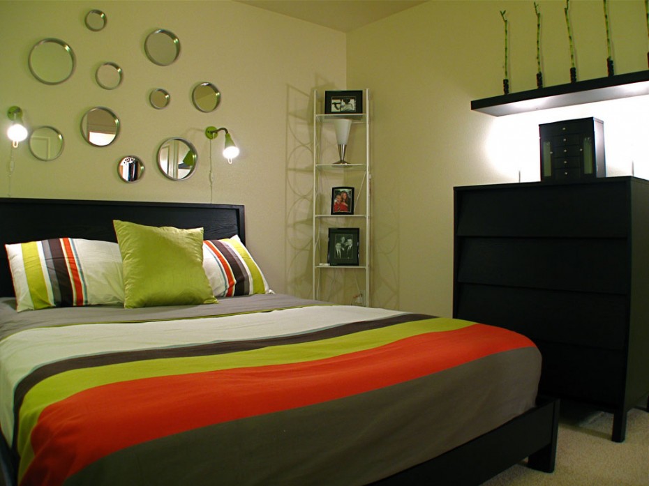 Bedroom Decorating Plan Escorted By Green Wall Color As Well As Round Wall Mirrors Also Wooden Storage Cabinet As Well As Drawers Also Downlights Also Platform Bed Escorted By High Headboard Also Colorful Stripes Interior Design