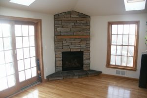 Kitchen Designs Thumbnail size Contemporary Corner Stone Fireplace Escorted By River Rock Brick Style Nice Triangel Ceiling Cool Golden Honey Window Trim Corner Stone Fireplace For Beautiful Livingroom