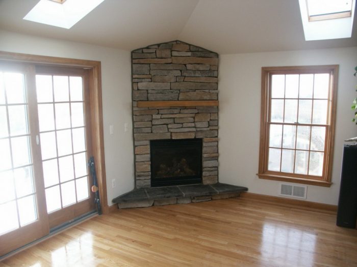 Kitchen Designs Contemporary Corner Stone Fireplace Escorted By River Rock Brick Style Nice Triangel Ceiling Cool Golden Honey Window Trim Corner Stone Fireplace For Beautiful Livingroom Stones for Fireplace: Various Designs of Fireplaces