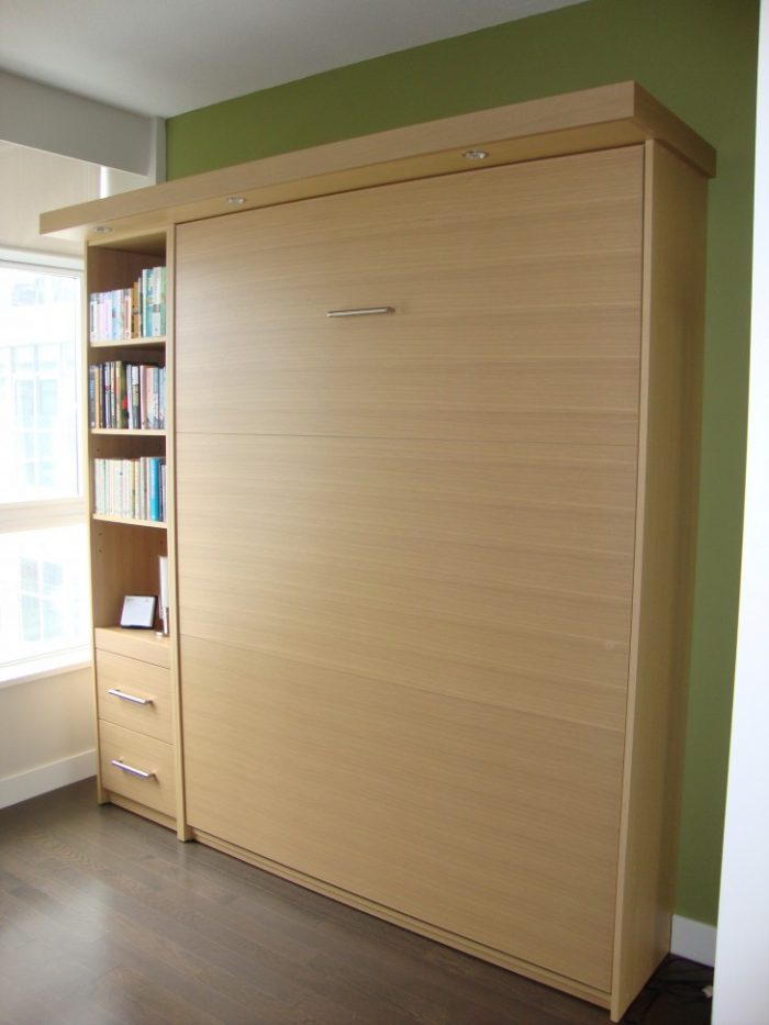 Bedroom Designs Couch Murphy Bed Escorted By Brown Wooden Bookshelves As Well As Wooden Drawer Having Steel Has Well Asle On Laminate Flooring As Well As Green Wall Magnificent Scheme Of Modern Murphy Bed To Inspire The Designer And Inspirations Of Modern Murphy Beds