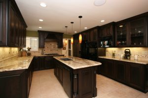 Kitchen Designs Thumbnail size Sweet Glass Pendant Island Lamps Over White Granite Countertops Kitchen Island As Well As L Shaped Dark Wood Cabinets In Open Kitchen Styles Piquant Dark Wood Cabinets For Women