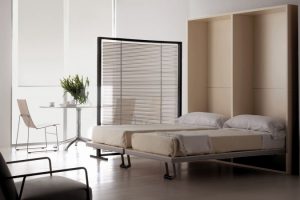 Bedroom Designs White Bed Escorted By Brown Wooden Couch Combined By Brown Wooden Shelves Also Storage On Laminate Flooring As Well As White Wall Magnificent Scheme Of Modern Murphy Bed To Inspire Your Bedroom The Designer And Inspirations Of Modern Murphy Beds