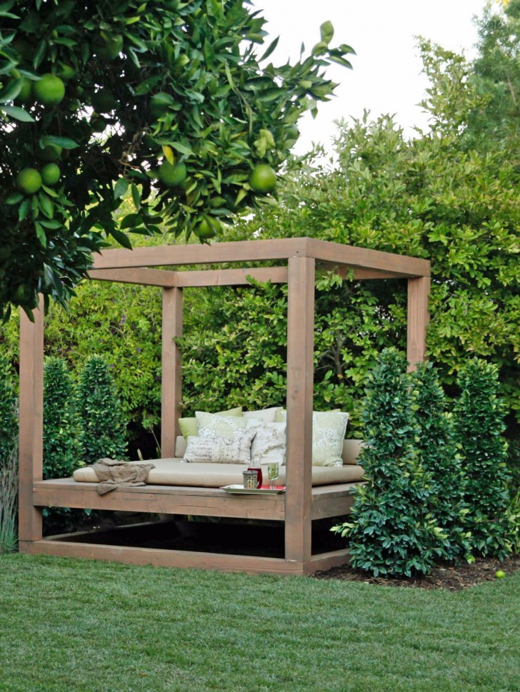 Brown Wooden Canopy As Well As White Pattern Pillows Near Green Tree On Green Grass Yard Fascinating Scheme Of Outdoor Daybed Escorted By Canopy Showing Modern Plan Ideas