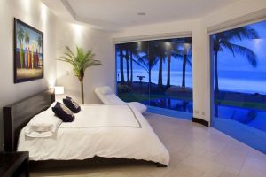 Bedroom Designs Thumbnail size Cool Contemporary Bedroom Design Ideas With Beautiful Beach Scenery Picture On The White Wall Bay Window White Bed White Pillow White Sofa Ceramic Flooring Coconut Tree