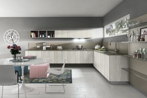 Kitchen Designs Thumbnail size Cool Gray Kitchen Design Ideas White Wooden Flooring Round White Table And White Chair Kitchen Island Kitchen Cabinet Floral Carpet Flooring Stainless Faucet Washbasin Brown Wall Brown Countertop