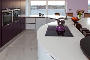 Kitchen Designs Thumbnail size Countertop Fresh Cut Flowers Orange Purple Teapots Transparent Glass Window Purple Wall Rattan Chair Brown Ceramic Nice Floor Tile Stopcontact Electric Double Wall Oven In Black Cup White Drawer