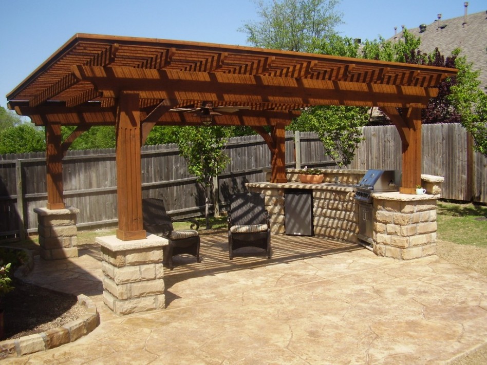 Delightfull Outdoor Open Space Kitchen Over The Wooden Ceiling Linen As Well As Hard Stone Cabinet Wall Along Escorted By Double Chairs Outdoor Kitchen Counter Tops Appliances Kitchen Designs