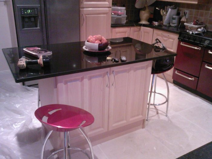 Ideas Excellent Picture Of Modern Small Kitchen Decoration Using Black Granite White Wood Kitchen Island Including Black Granite Kitchen Counter Tops As Well As Round Red Steel Kitchen Chairs Entrancing Ways To Clean Granite Kitchen Tops