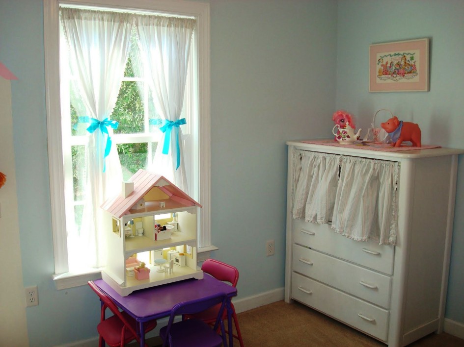 Kids Room Design With Picture Frame With Toys With Glass Window Design With White Curtain Design With Chest Of Drawer With Mini Chair Design With Laminate Flooring Design Ideas Interior Design