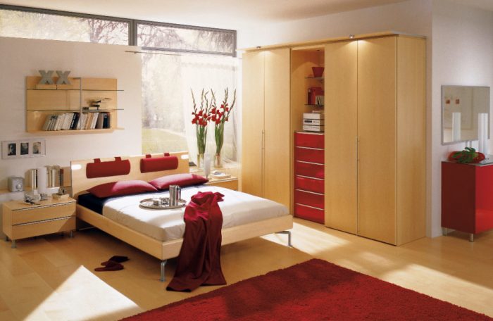 Interior Design Modern Bedroom Design Ideas Red Carpet Flooring Wooden Flooring White Wall Red Pillow Large Wardrobes Fresh Cut Flower Bookshelves Chest Of Drawer Mirror Glass Window Cozy Bed Interior Bedroom Ideas Environmentally Friendly Carpet For Interior