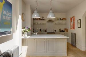 Kitchen Designs Thumbnail size White Kitchen Design Ideas With Pendant Lamp And White Open Kitchen Shelving Design Ideas With White Wall Design And White Kitchen Island Design With Wooden Flooring