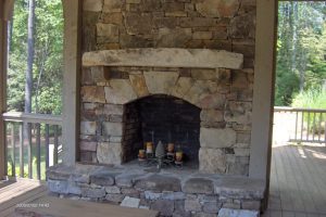 Living Room Designs Thumbnail size Rustic Stone Fire Place Styles Scheme For Outdoor Lounge Spaces Escorted By Natural Shelf Also Antique Candle Holders Also Wooden Table Escorted By Simple Railings Of Stone Fireplaces